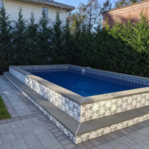 Stealth steel wall pool finished with tile